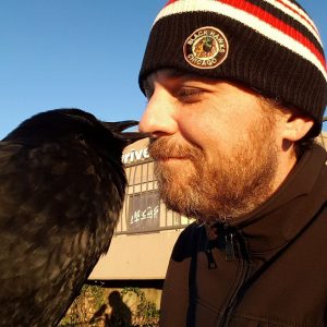 Canuck the crow and best friend Shawn Bergman.